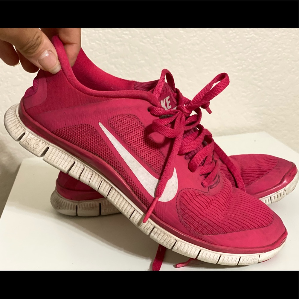 Pink Nike running shoes